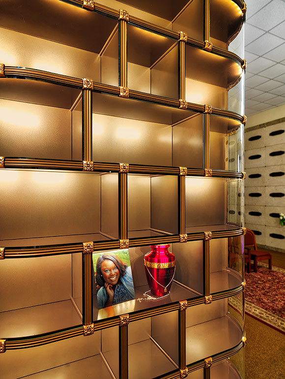 In addition to placement of an urn, the generous niche space with UV light resistant glass fronts and interior concealed LED lighting, allow for a tasteful display of a photograph and personal memento.