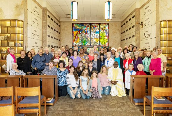 The people who attended the Month's Mind Mass on December 29, 2018 pose for a group photograph.