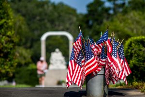 Additional United States Flags await those arriving for Mass at Calvary Catholic Cemetery at Clearwater, Fla. on this warm and breezy Memorial Day, May 27, 2019.