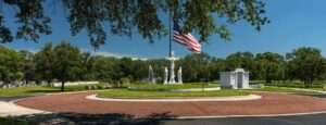 The American Flag at Calvary Catholic Cemetery flies at half-staff in recognition of those who have made the ultimate sacrifice for their country.