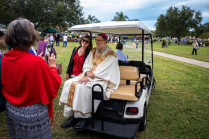 At the conclusion of the Mass and prayers at the priests’ gravesites, there are always many of the faithful eager to greet the bishop and have their photograph made with him.