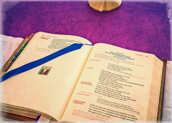 The Roman Missal sits on the outdoor altar open to the prayers of the day for Mass on All Souls’ Day. Close to 200 of the faithful were sprinkled under the monumental oak trees and canopies around the outdoor altar as Bishop Gregory L. Parkes and priests of the Diocese of St. Petersburg celebrate Mass in remembrance of departed loved ones.
